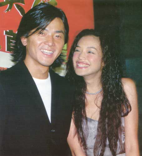 Hsu Chi and male bimbo at her side