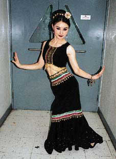 1999 picture of Moon and her dance costume - I prefer a gun in her hand myself!