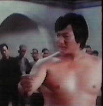 Sammo showing his 'hard body'